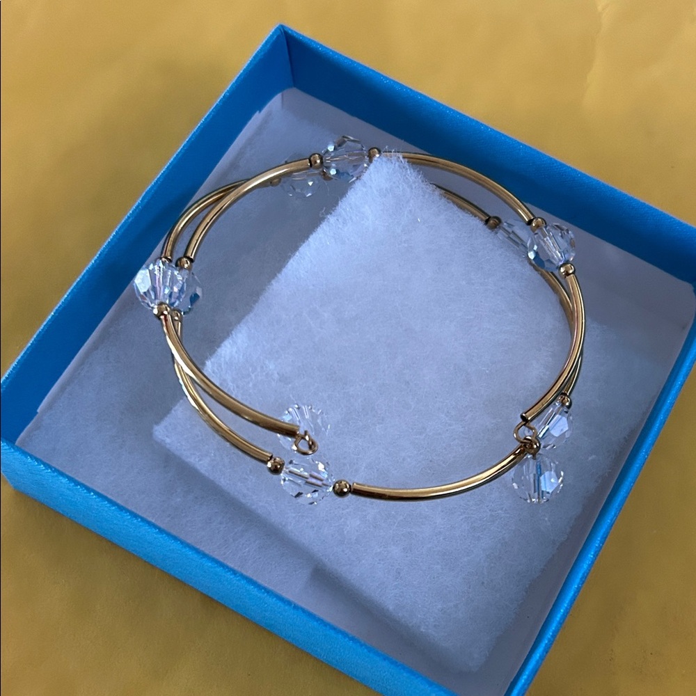 Touchstone crystal ,wind up gold